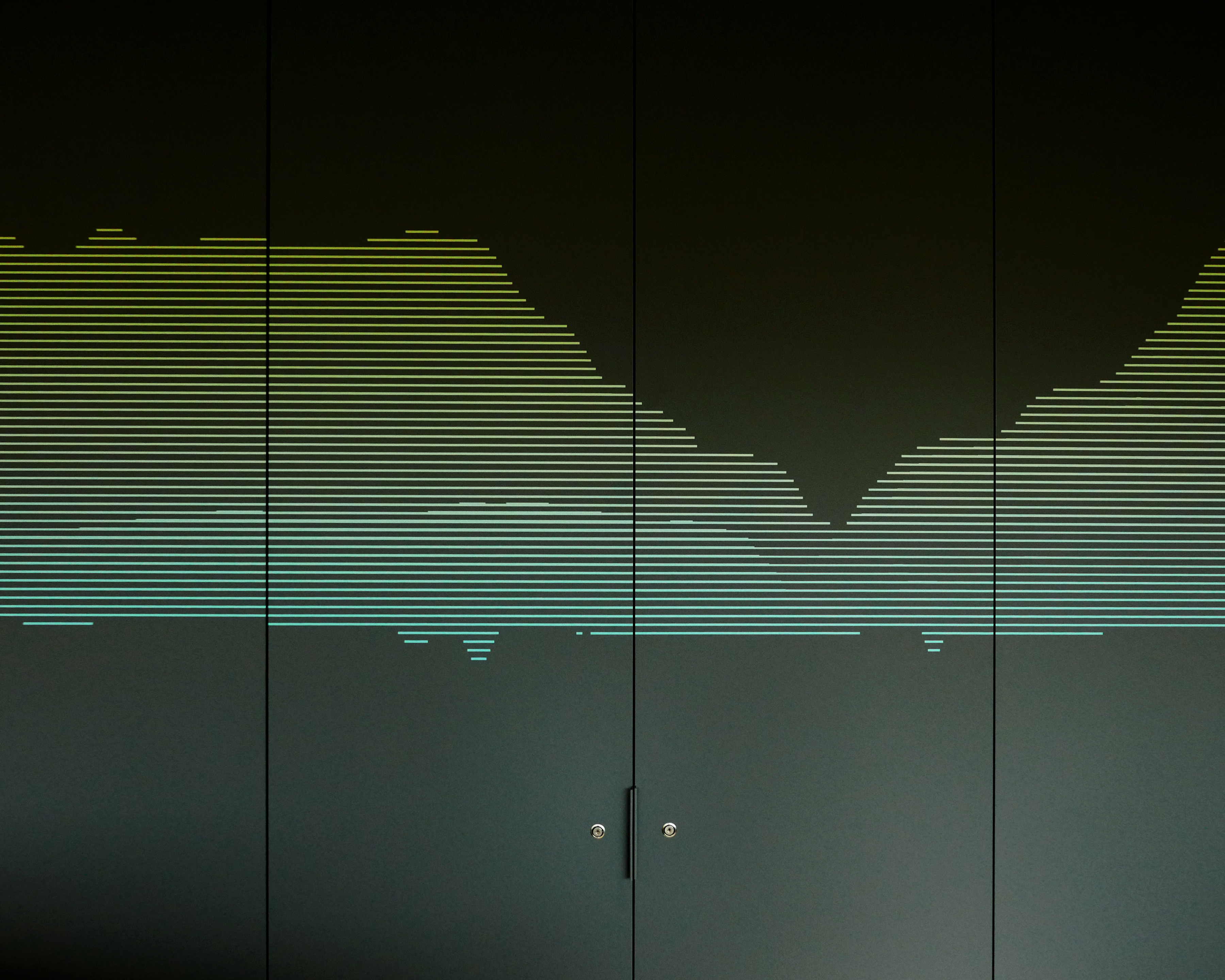 A site-specific design for the Two Sigma London office, which visualizes the elevation contours of the City of London from the side.