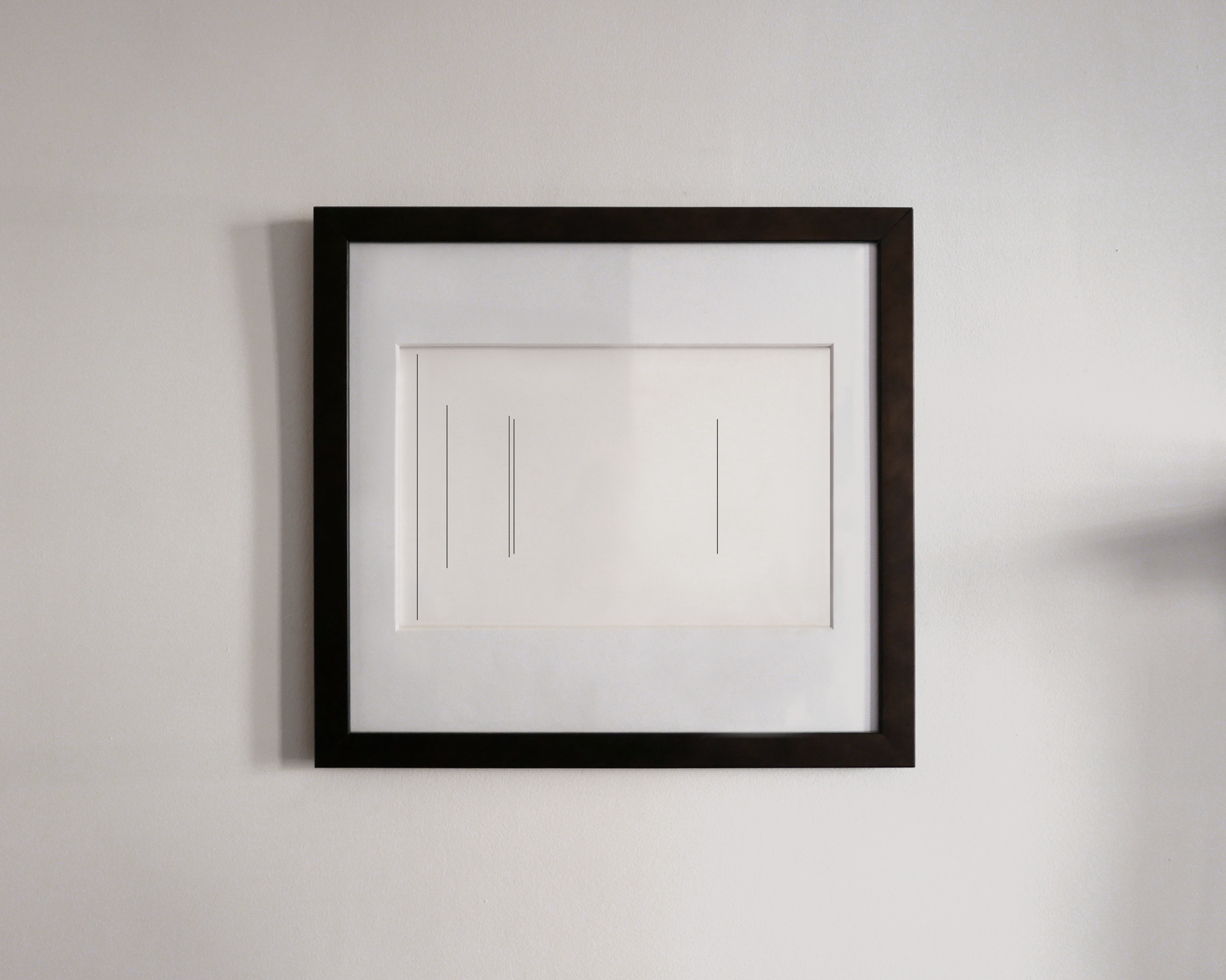 A framed print that makes visible its perspective of the surrounding walls.